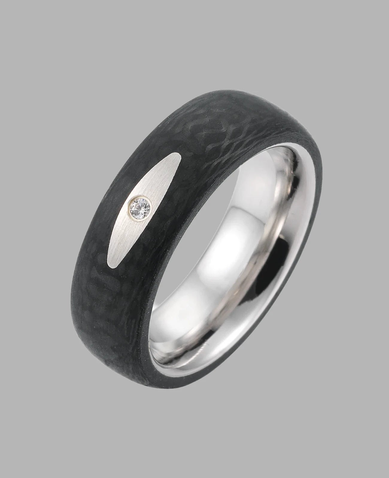 Rundlicher Carbonring in der Mitte ovale Fläche mit 1 Zirkoniastein