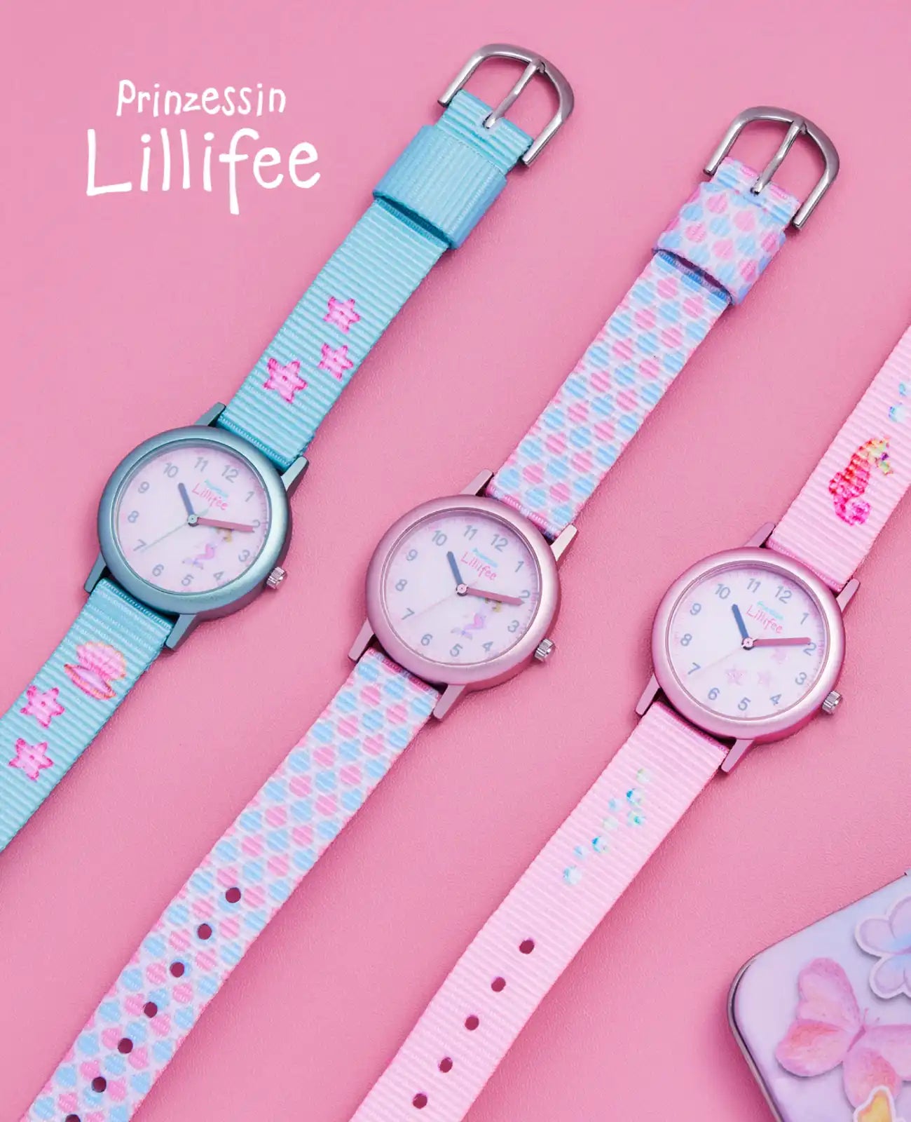 Rosa Kinderuhr mit arabischen zahlen und seesternmotiv am Textilarmband
