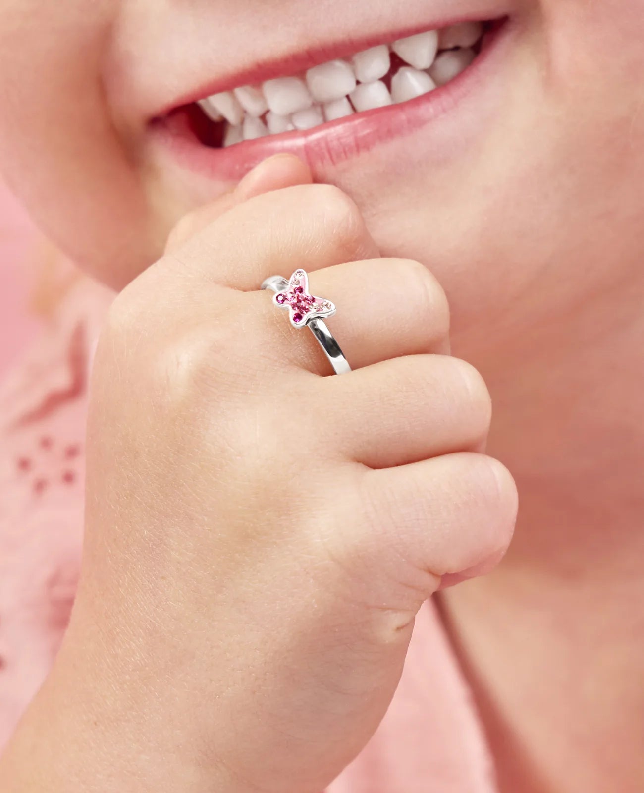 kinderring mit rosa schmetterling und zirkonia