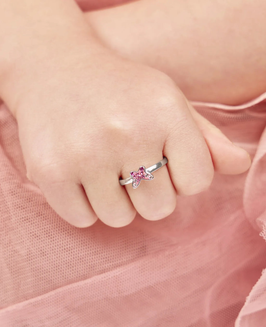 kinderring mit rosa schmetterling und zirkonia