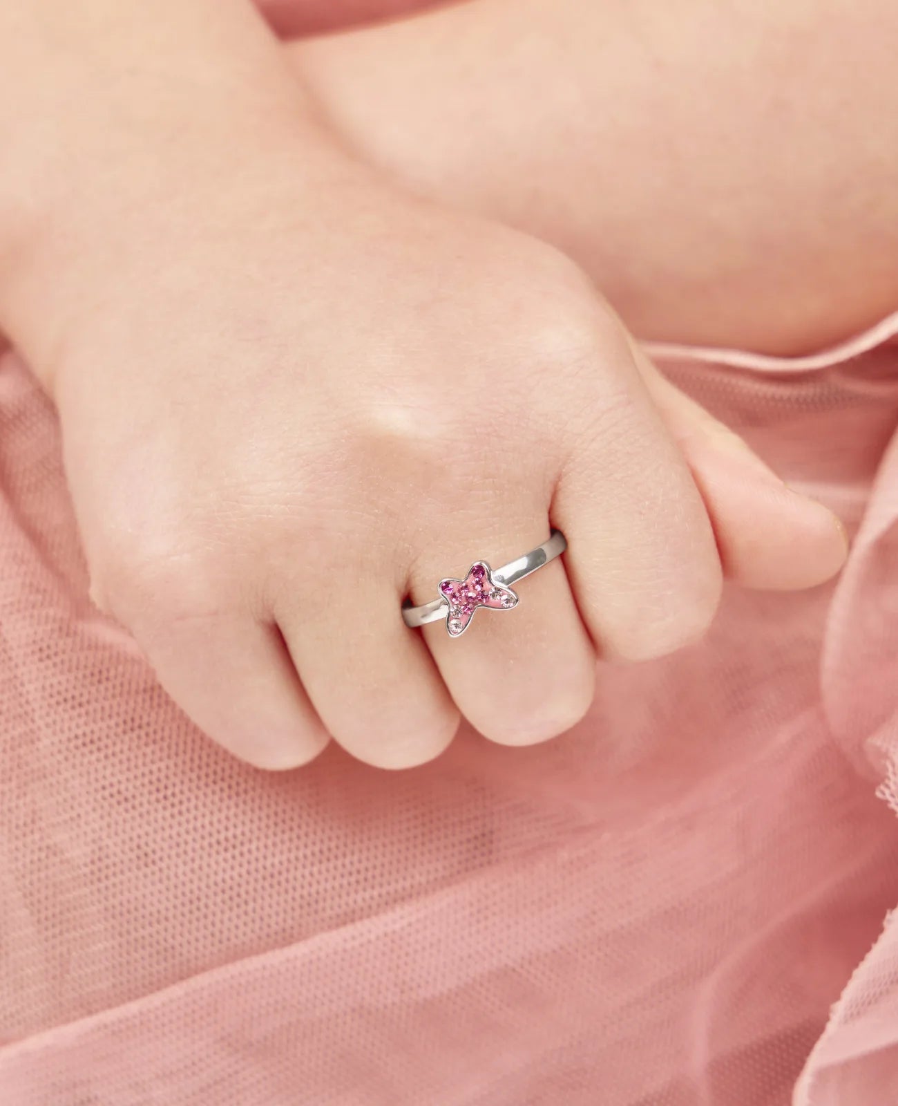 kinderring mit rosa schmetterling und zirkonia