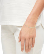 goldfarbenes tennisarmband lauter angereihte zirkonia steine in zargenfassung
