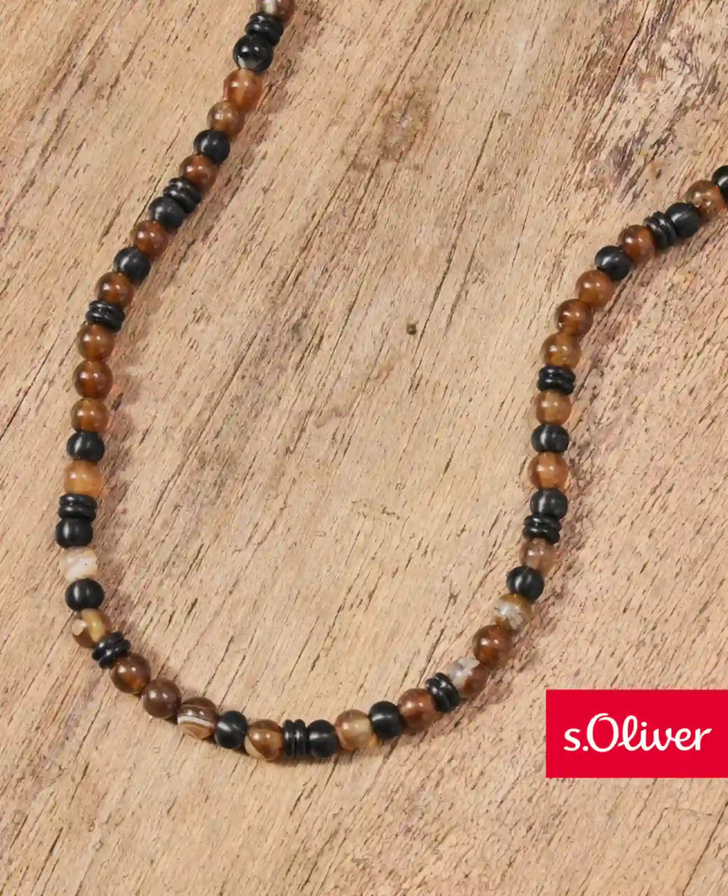 braune steinkette mit schwarzen edelstahl elementen