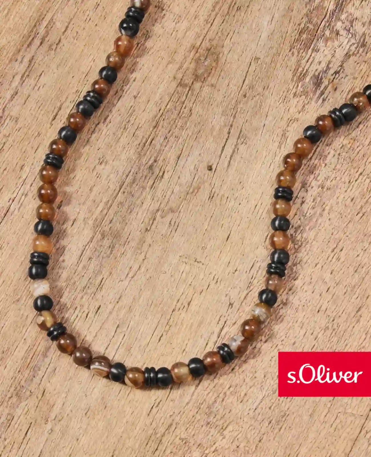 braune steinkette mit schwarzen edelstahl elementen
