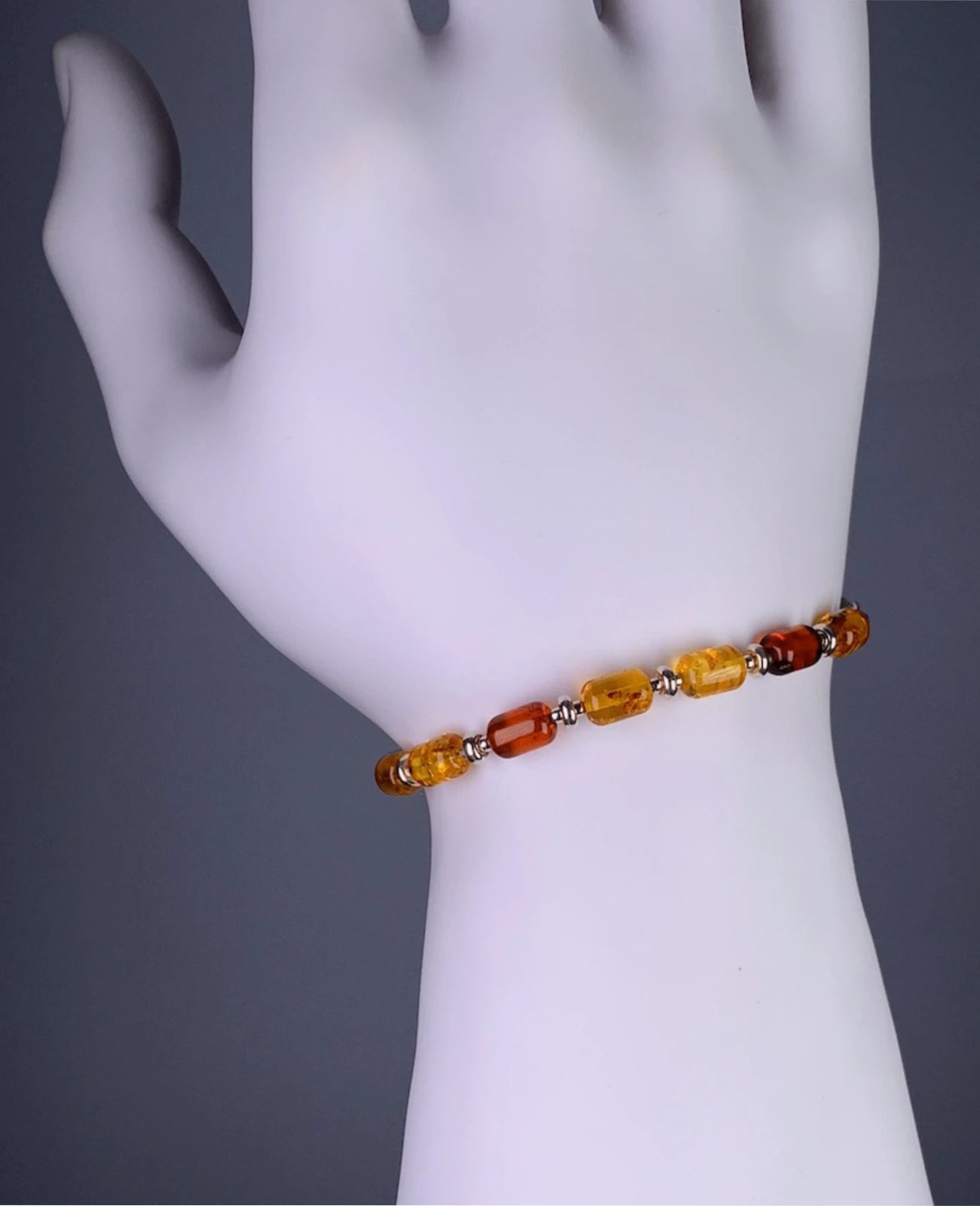 armband mit zylindrichen Bernstein und silber Scheiben  als zwischenteilen