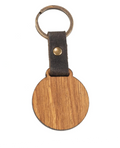 runde holzscheibe mit lederband am schluesselring