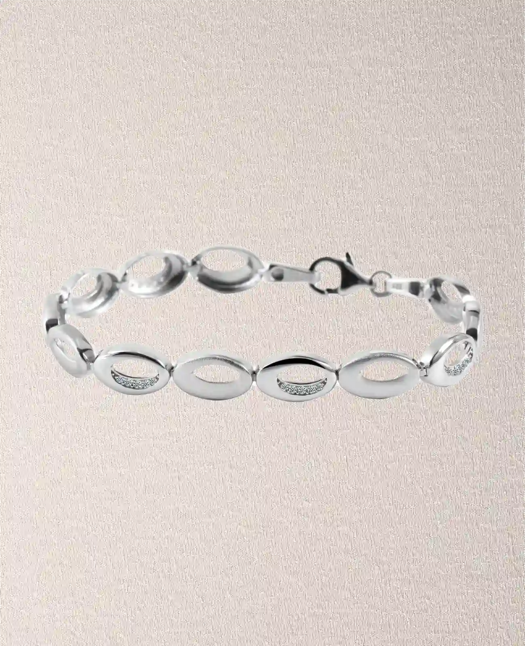 armband aus ovalen beweglichen Gliedern zum Teil mit Zirkonia steinen