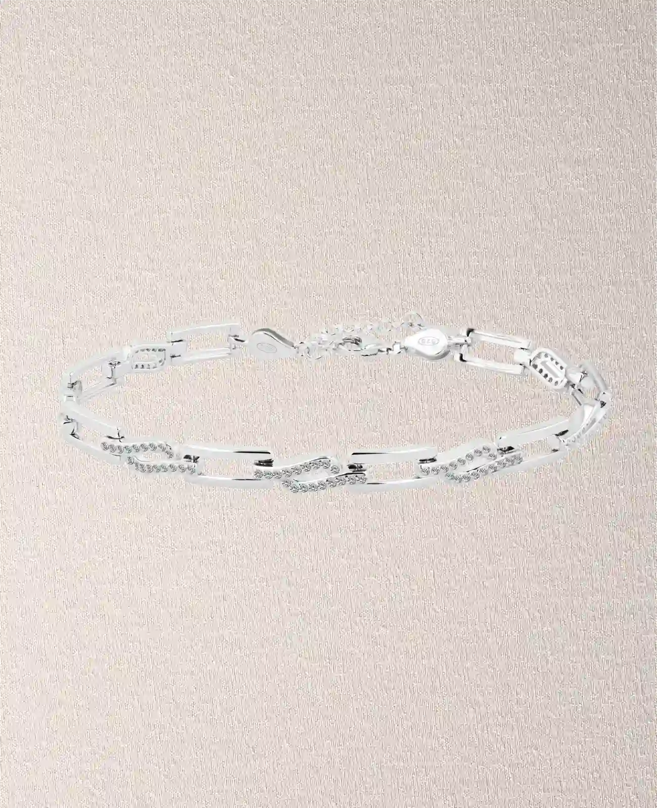 Armband aus rechteckigen beweglichen Gliedern zum Teil mit Zirkonia Steinen