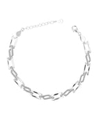 Armband aus rechteckigen beweglichen Gliedern zum Teil mit Zirkonia Steinen