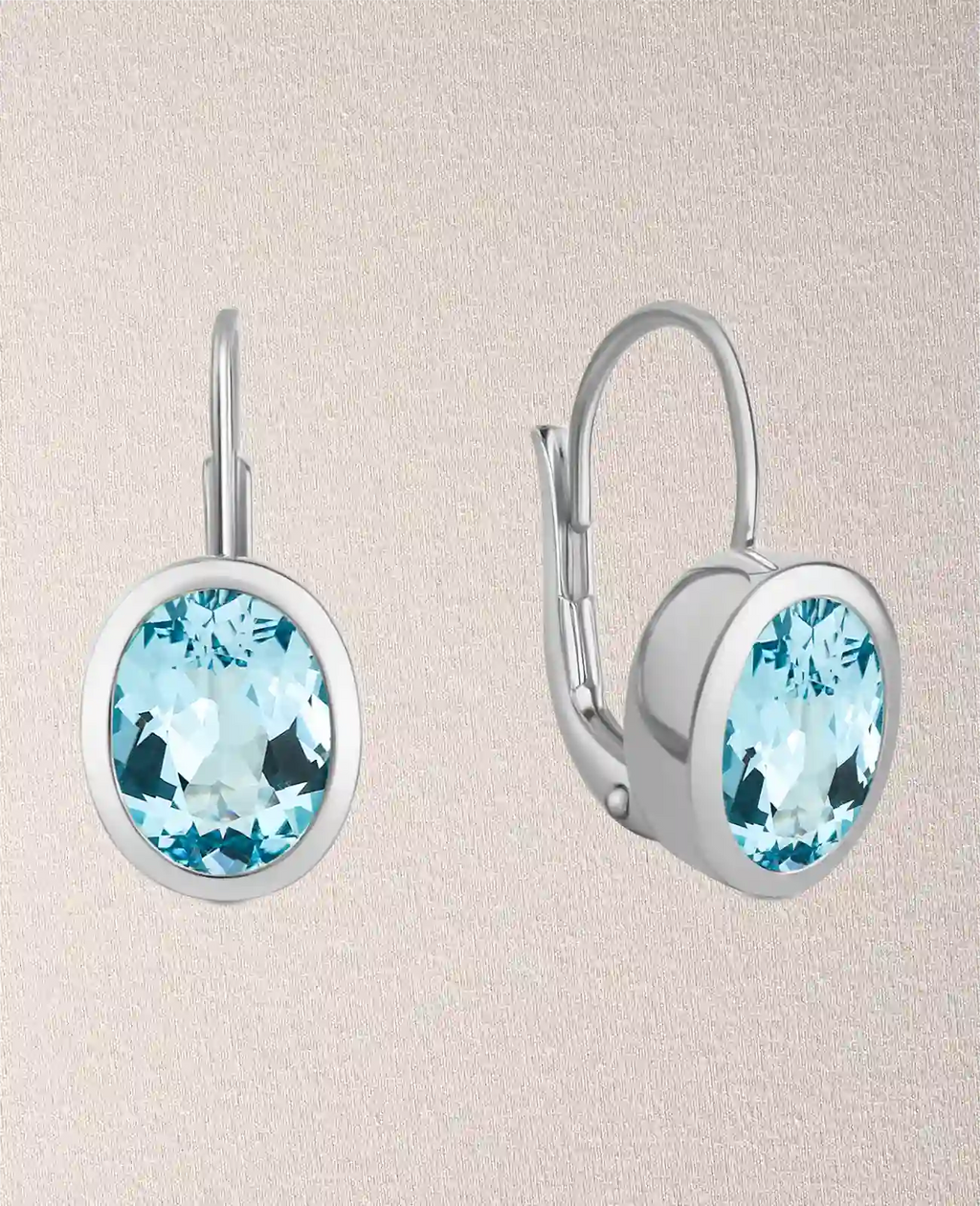 kurze button ohrhänger mit ovalen blautopas