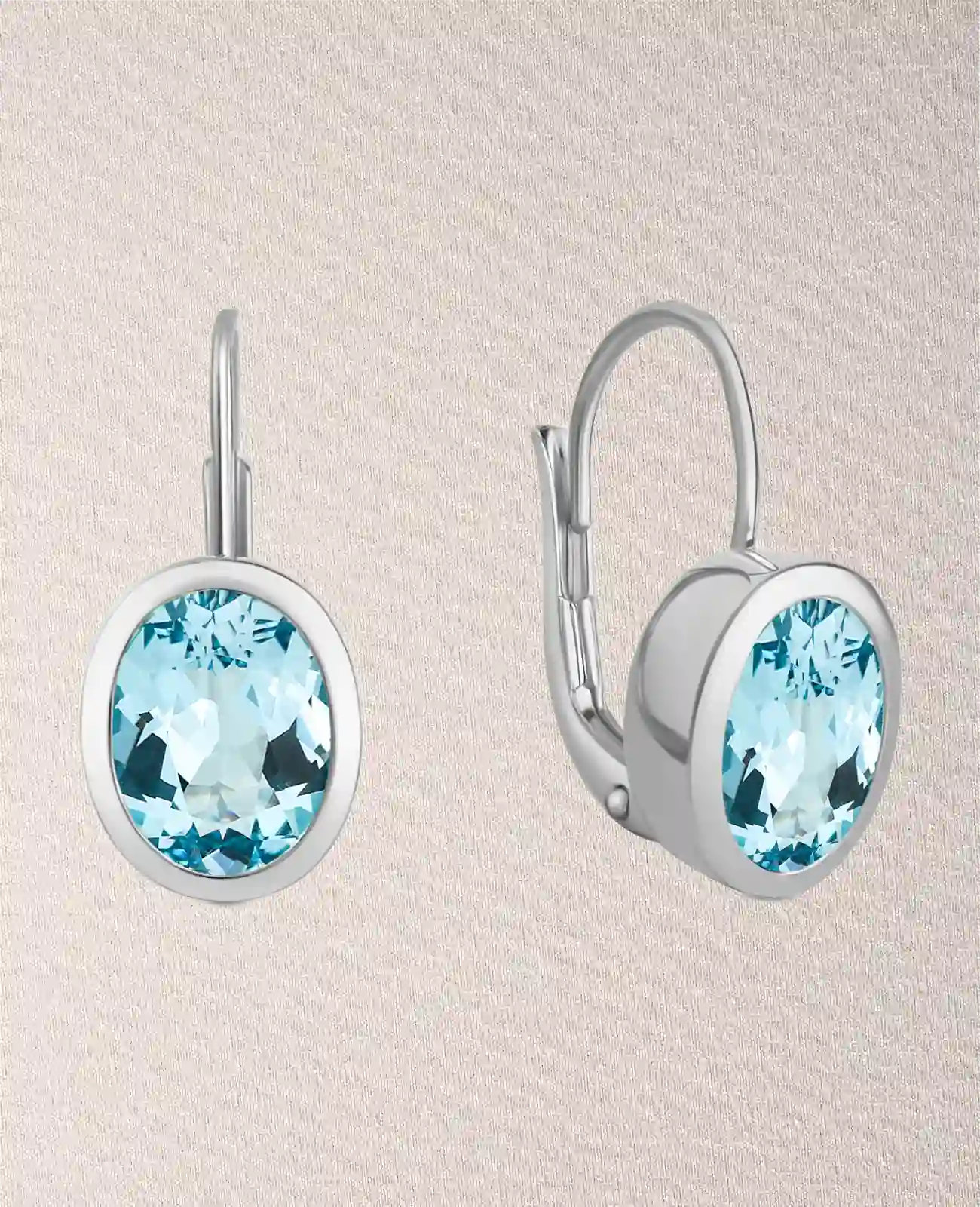 kurze button ohrhänger mit ovalen blautopas