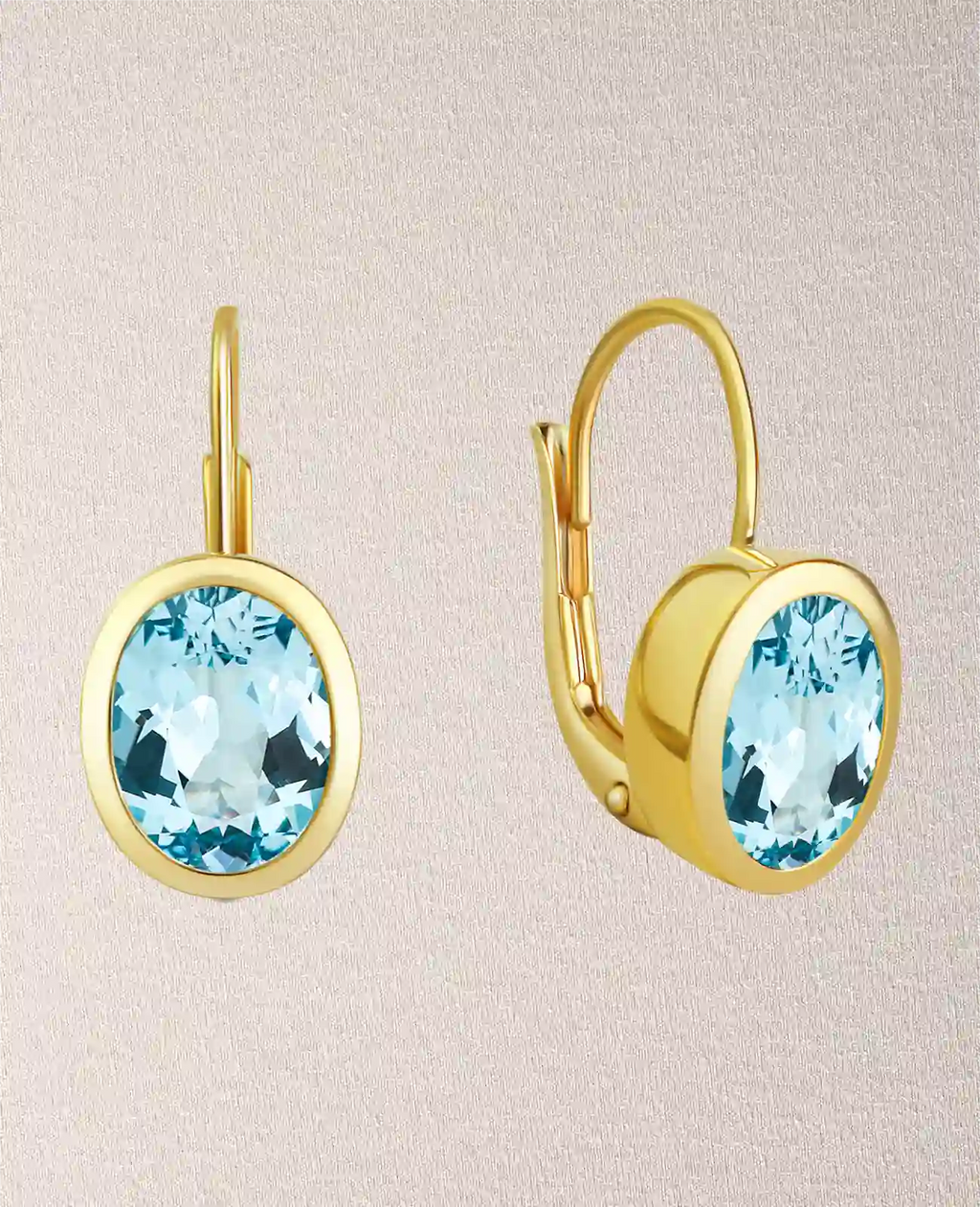 kurze button ohrhänger mit ovalen blautopas