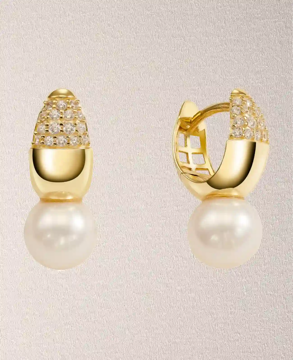 Tropfenförmige Creole obere hälfte mit zirkonia steinen besetzt unten große perle