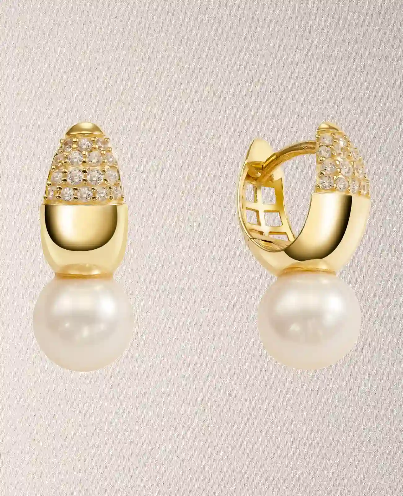 Tropfenförmige Creole obere hälfte mit zirkonia steinen besetzt unten große perle