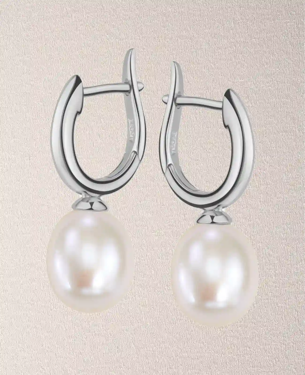 creolen mit baumelnder ovaler süßwasserzuchtperle