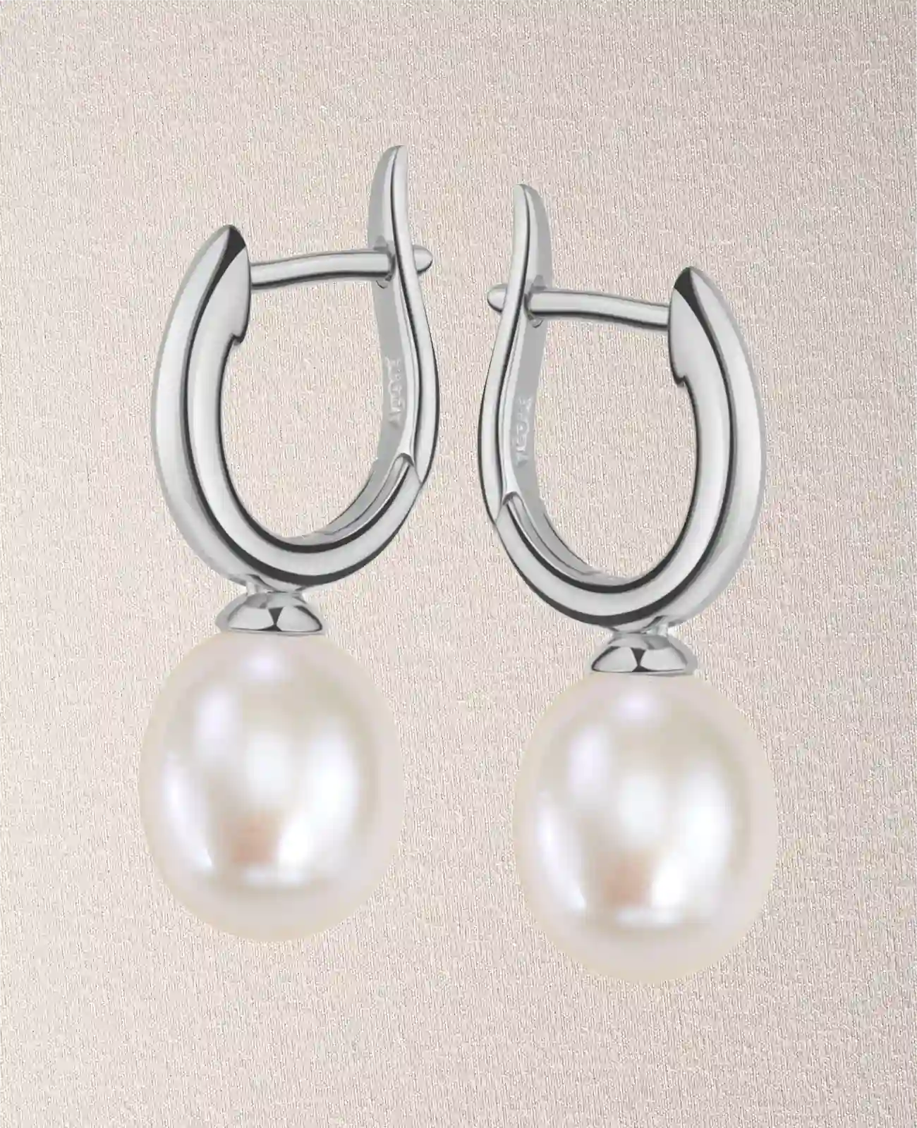 creolen mit baumelnder ovaler süßwasserzuchtperle