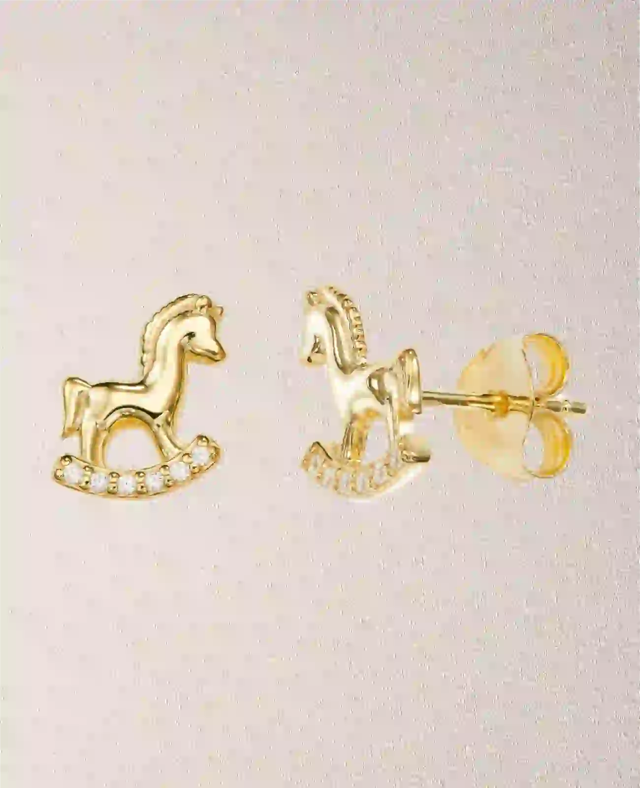 Ohrstecker Schaukelpferd die untere schwinge mit zirkonia steinen besetzt