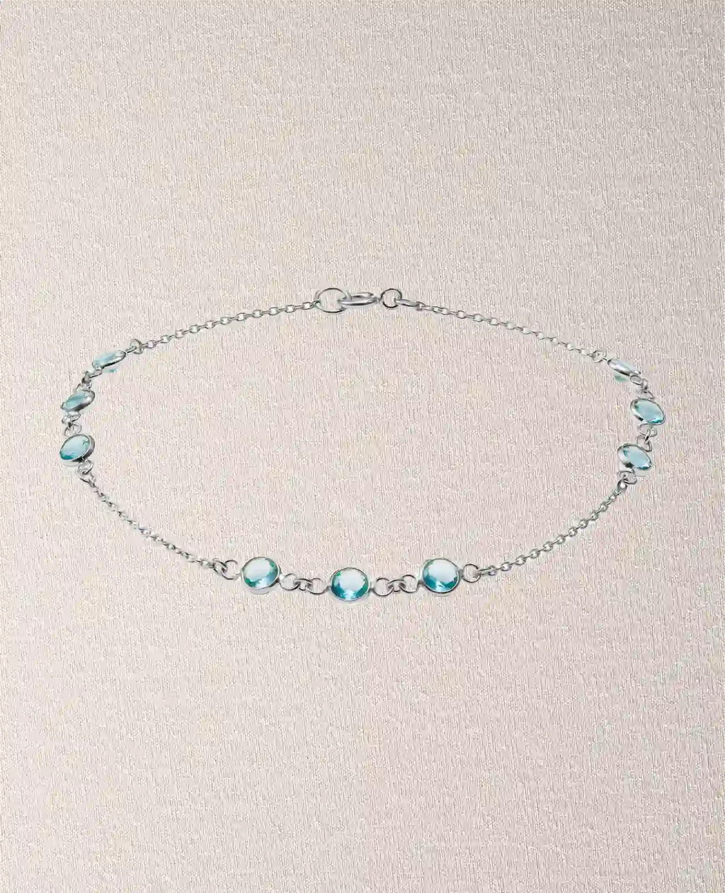 ankerkette armband mit dreierblöcken runde hellblaue zirkonia steinen