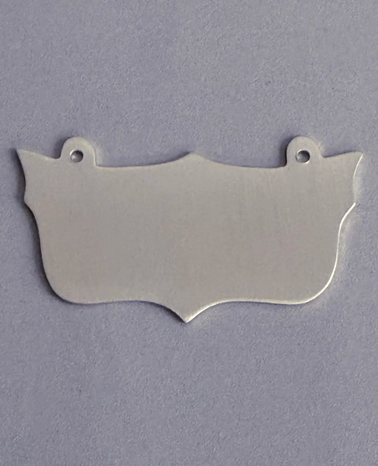 glattes gravurschild in Wappenform