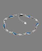 Armband mit beweglichen geschwungenen Platten mit blauen Opalen besetzt