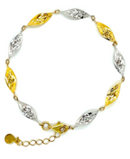 armband mit abwechselnden gold und weissgold gedrehten gliedern
