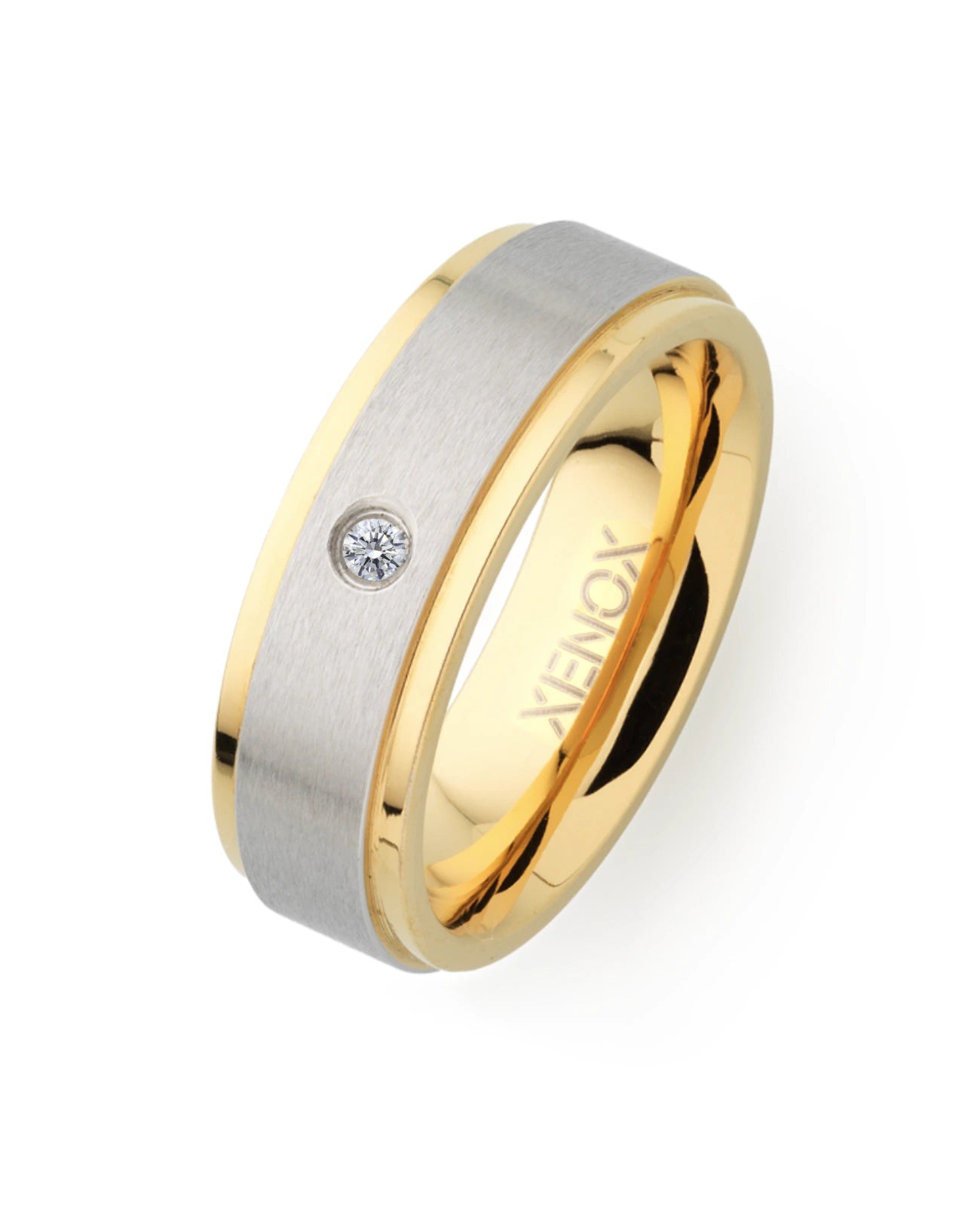 ring mit zirkonia in der mitte rechts und links abgesetzt goldfarben