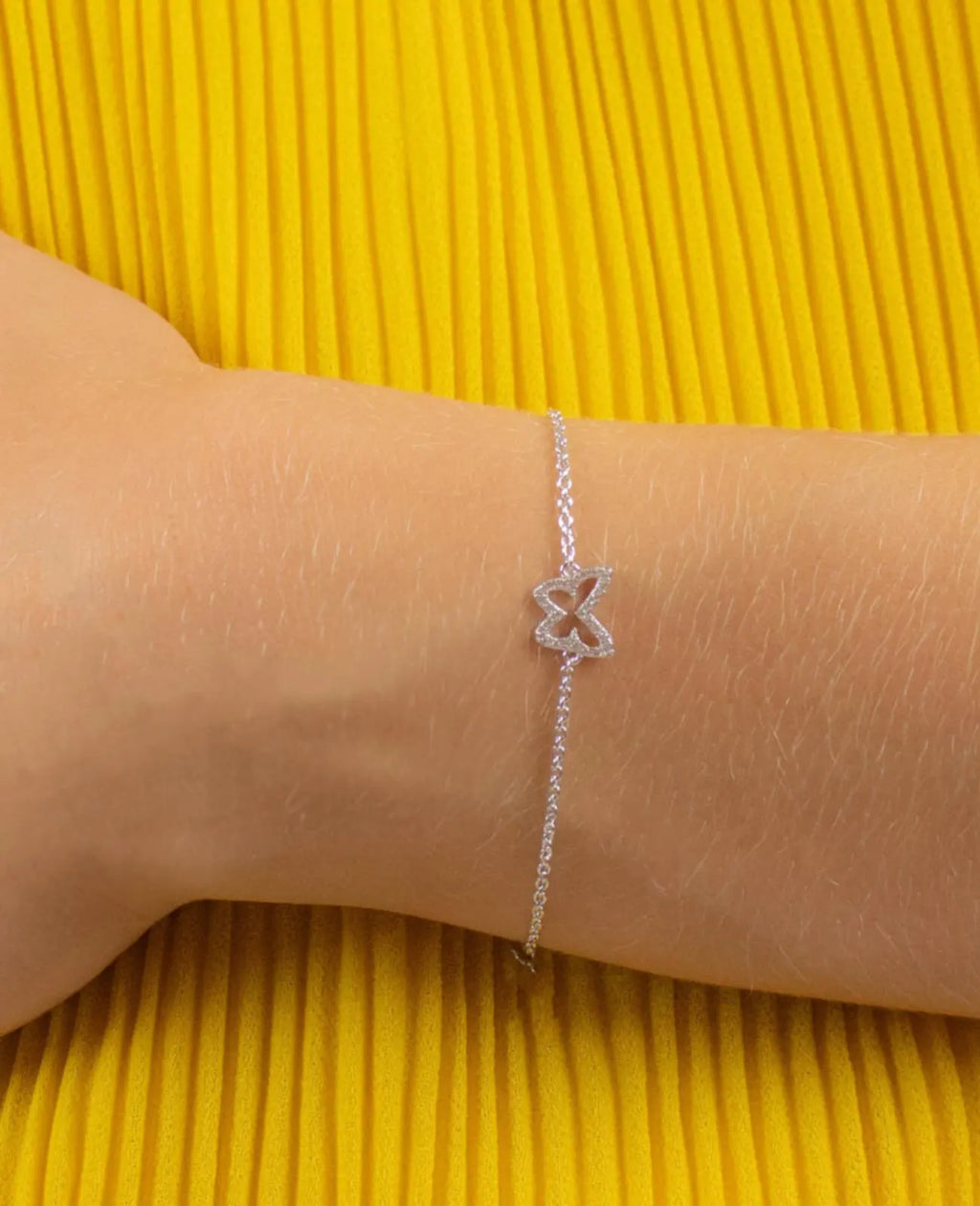 anker armkette mit schmetterling Symbol voll mit steinen besetzt