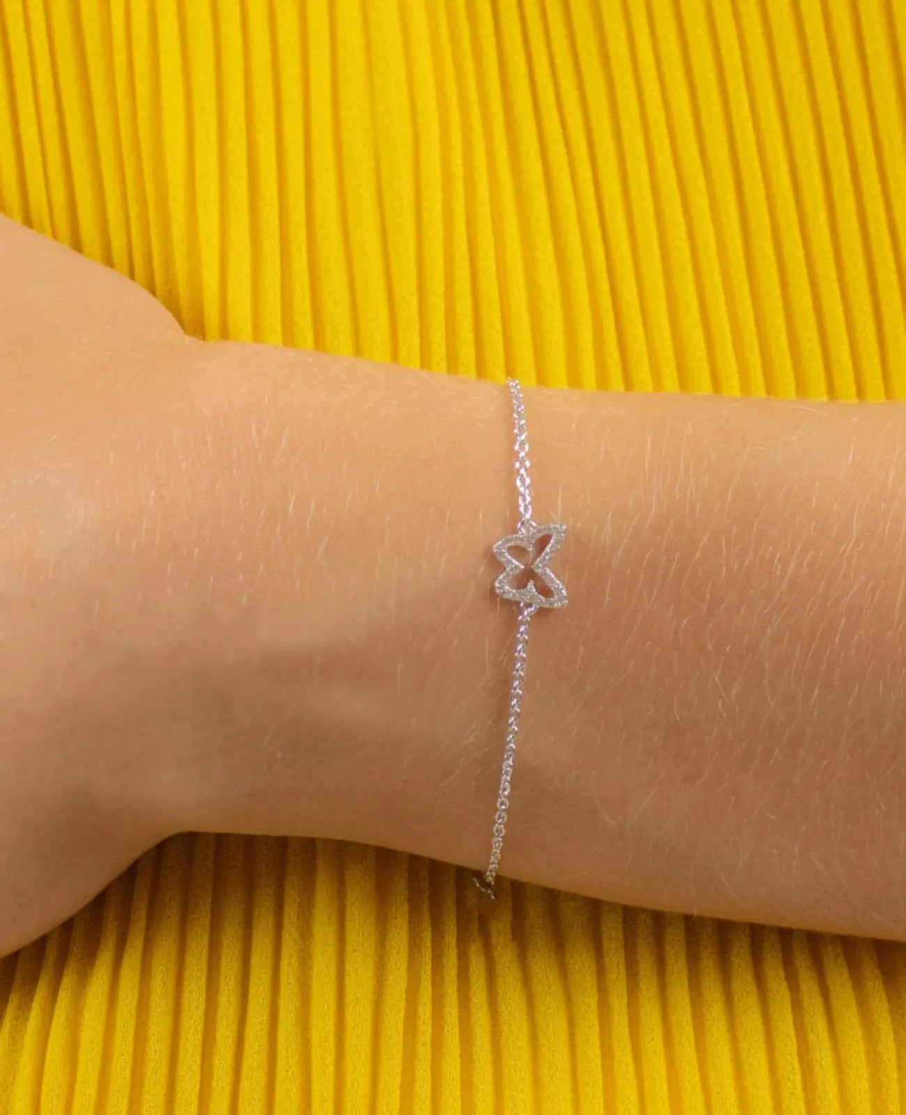 anker armkette mit schmetterling Symbol voll mit steinen besetzt