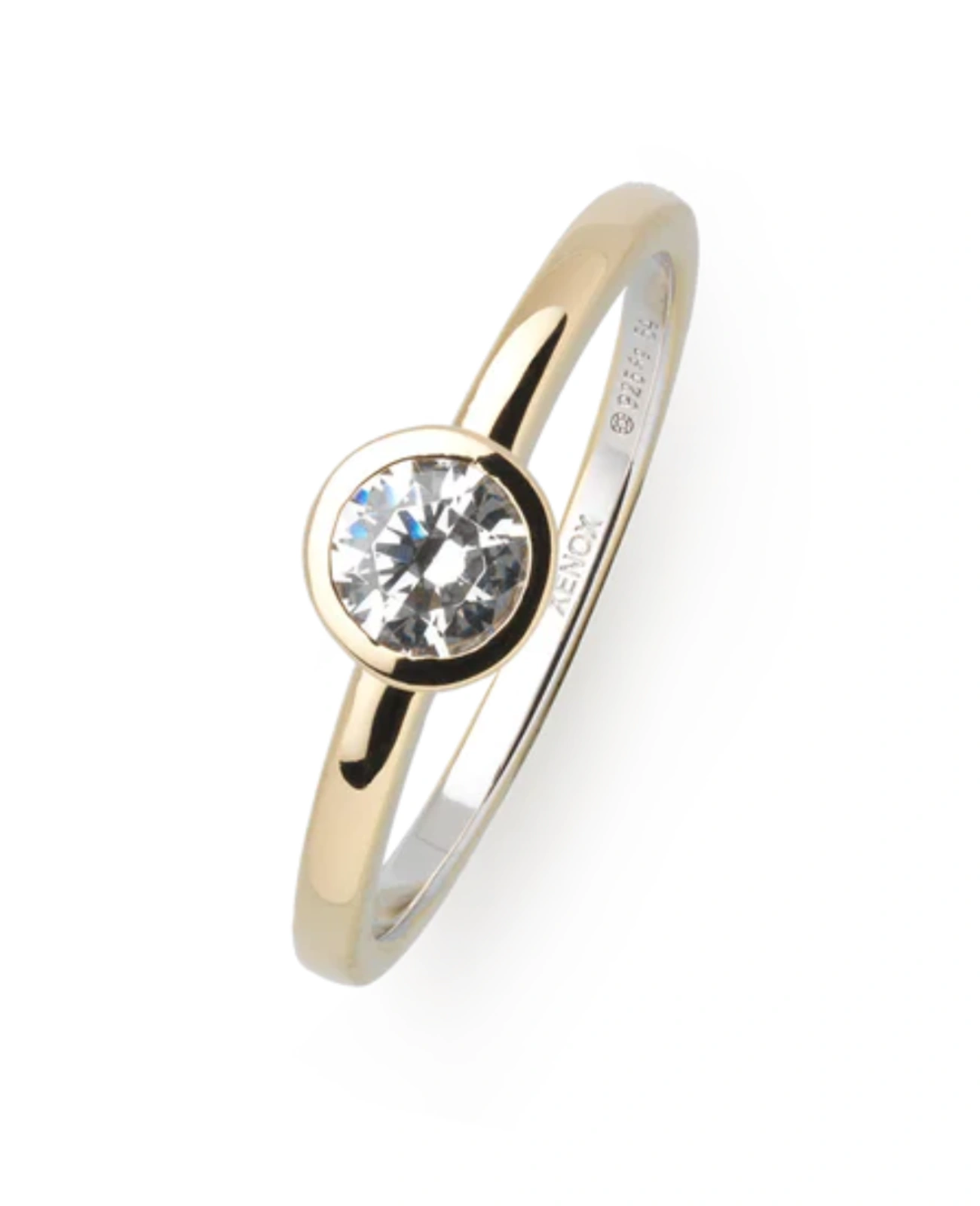 Ring goldfarben mit großen zirkonia in zargenfassung